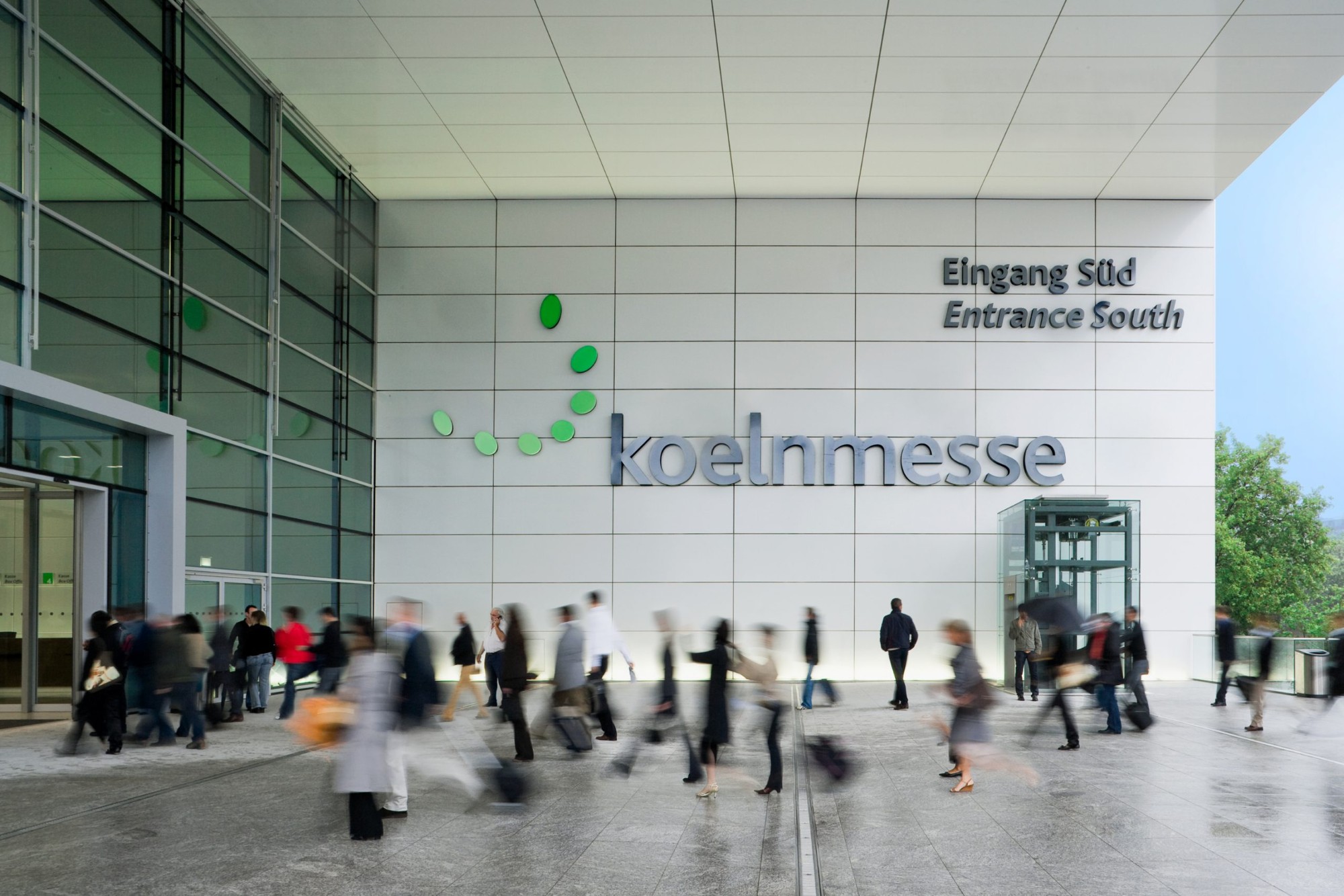Visitors arriving at the South Entrance of the Koelnmesse exhibition centre in Cologne